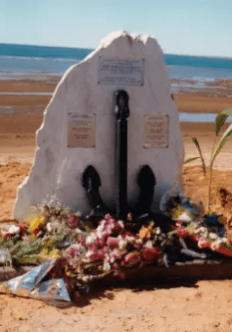 Memorial grave stone on the beach